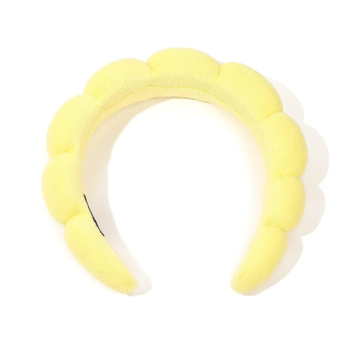 Yellow headband with cloud design on a white background